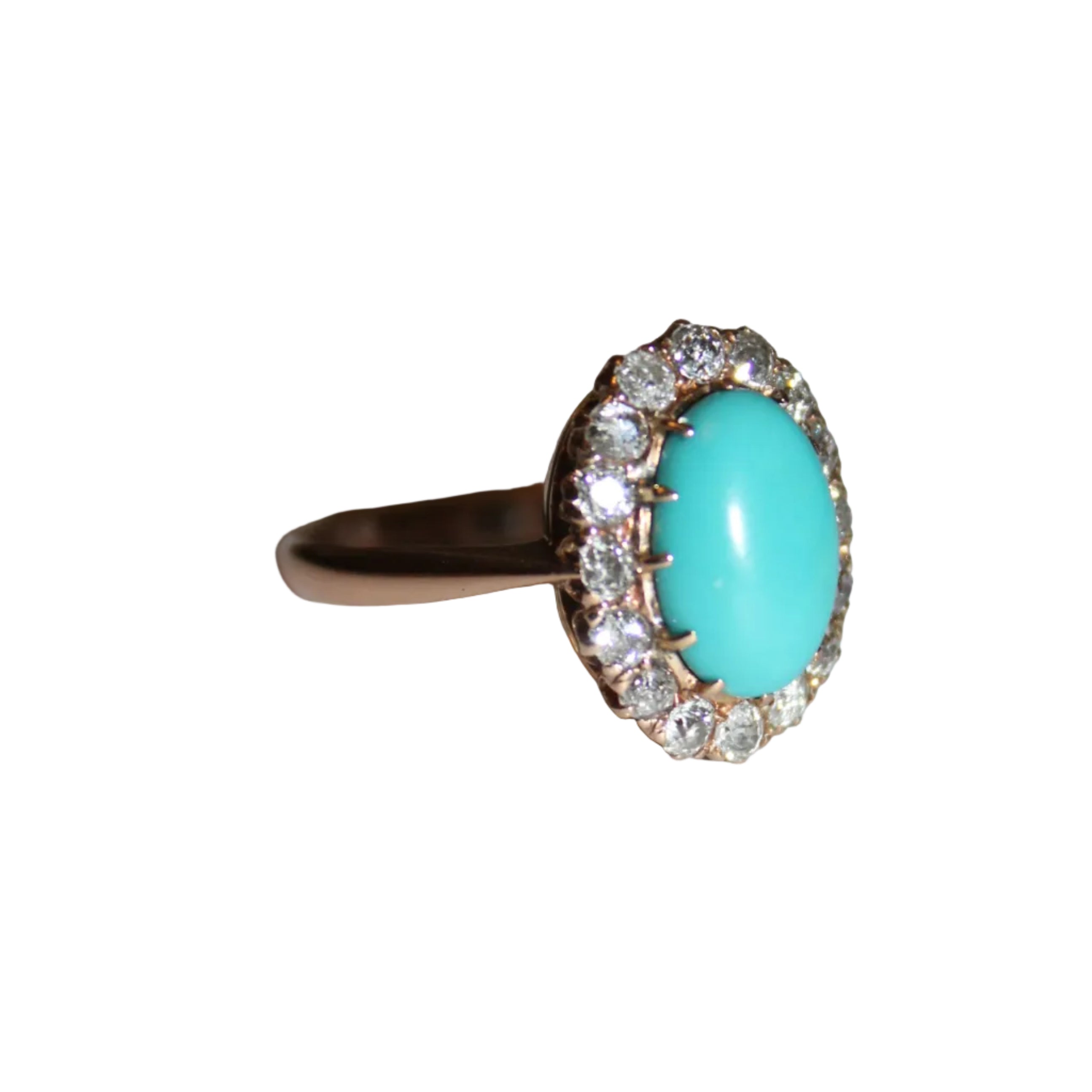 Ring with a turquoise stone and diamond accents on a light background