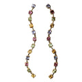 Multicolored gemstone earring on a white and black background