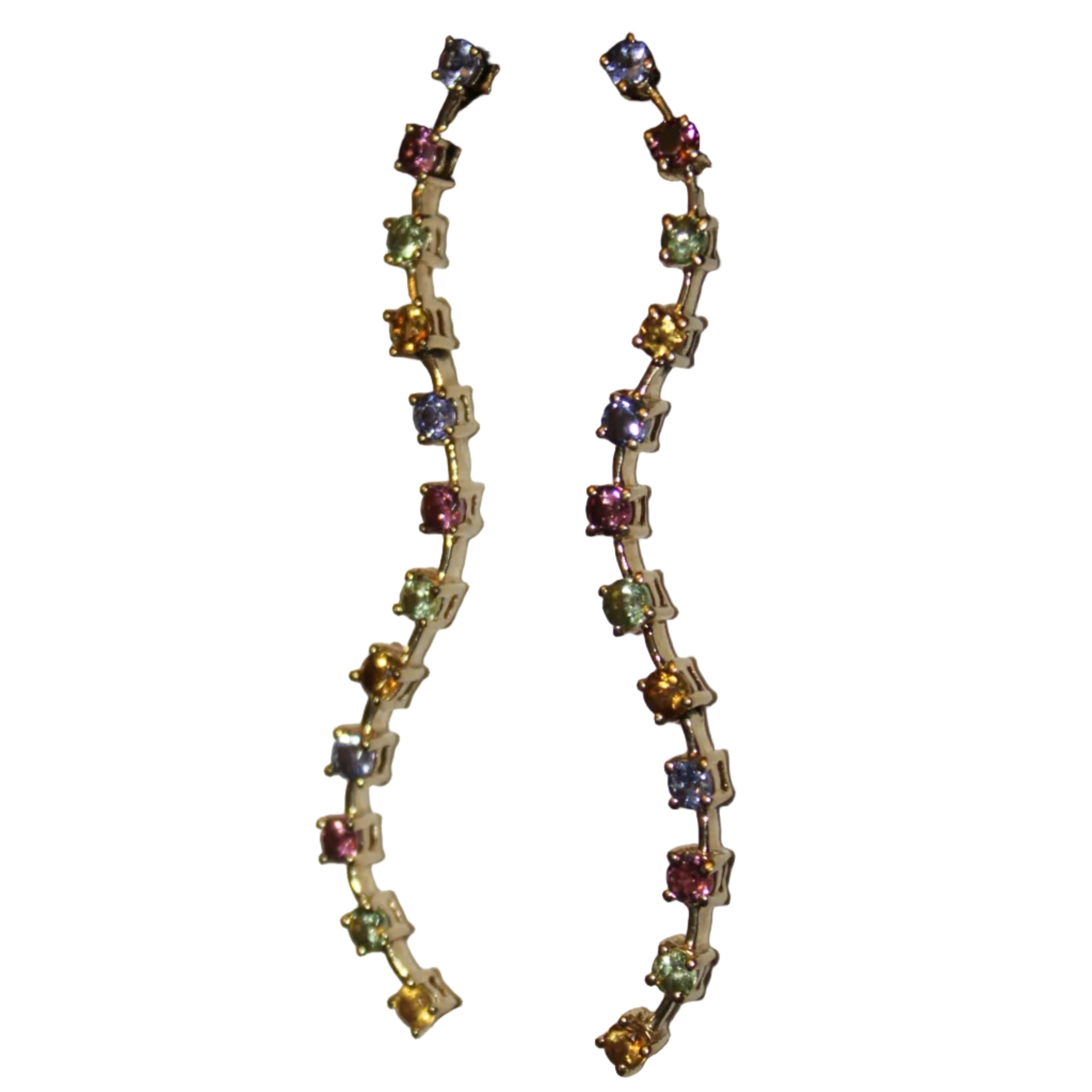 Multicolored gemstone earring on a white background