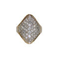Gold ring with diamonds on a white background