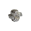 Platinum ring with diamond accents on a white background