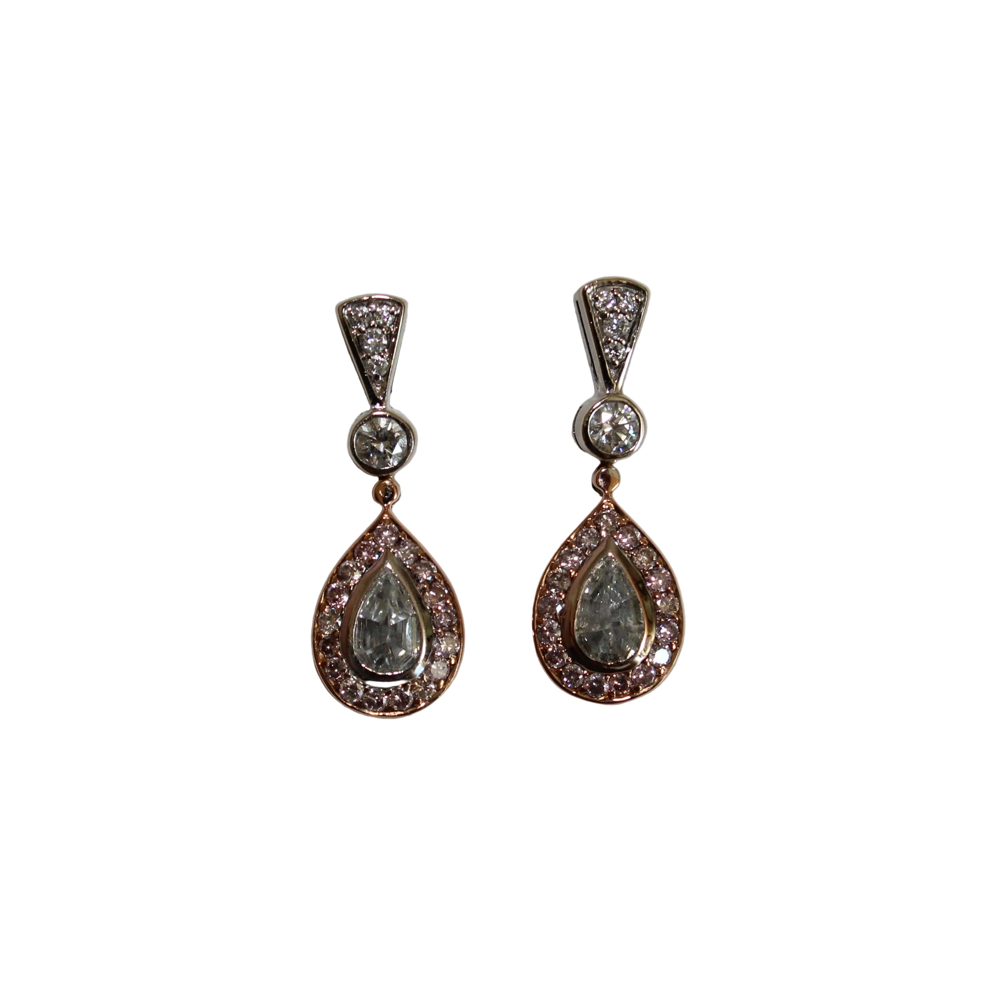 Pair of teardrop-shaped earrings with gemstones on a light gray background